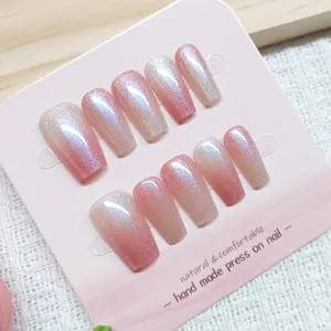 Handmade press on nails with cat eye gradient pink design, long coffin shape set for women.