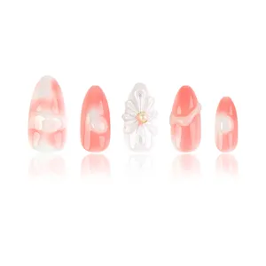 Uñas postizas hechas a mano con diseño rosa degradado romántico y perlas florales 3D.