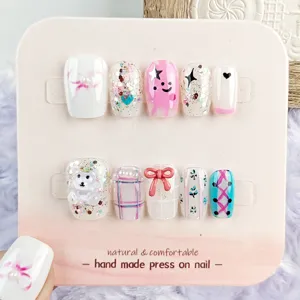 Uñas postizas hechas a mano con oso 3D lazo borde rosa pedrería lindo set de manicura.