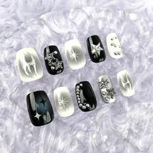 Y2K uñas postizas góticas press on set negro blanco degradado estrella plata remaches mano