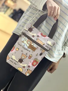 Cute cartoon bear print waterproof canvas handbag tote bag for daily casual use.