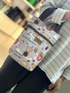 Waterproof cartoon capybara handbag with zipper pocket and cute print for daily use.
