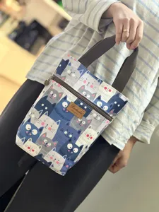 Cute cartoon cat canvas handbag water cup bag portable waterproof small tote bag for women.
