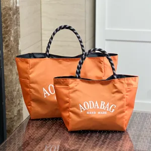 Orange large capacity tote bag mommy bag work commuting shopping bag with black white handle