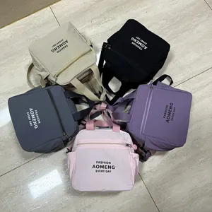 Waterproof insulated lunch bag detail showing multi-color commuter bento handbag options.