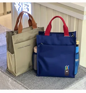 Multi-layer thickened color-blocking tote bag for student commuting, large capacity file bag.