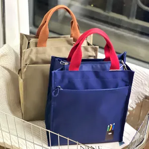 Color-blocked multi-layer thickened tote bag, student tutoring document bag, large capacity.