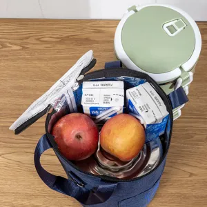 Round insulated lunch bag with thick aluminum foil lining, large capacity waterproof portable bag.