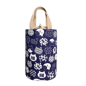 Japanese style cylindrical canvas lunch bag with cute cat print, portable bento tote.