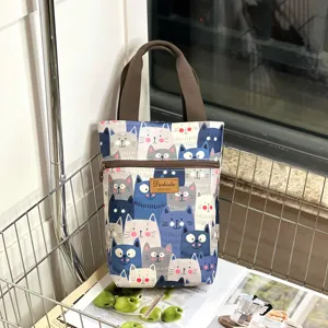 Canvas cartoon cat tote bag, cute multi-functional small handbag with zipper for daily use.