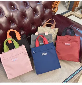 Colorblock canvas lunch bag tote handbag for women students daily office work commuting.