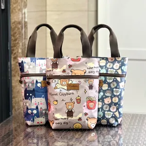 Canvas cartoon print tote bag with zipper pocket, cute handbag for water cup and daily essentials.
