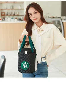 Round insulated lunch bag with green handles and front pocket, perfect for office and daily use