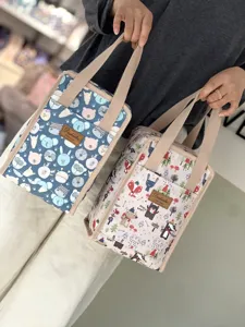 Waterproof insulated lunch bag with cute animal cartoon print, portable bento tote.