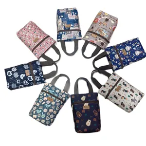 Waterproof cartoon tote bag, cute printed hand bag, portable water cup and umbrella pouch.