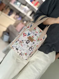 Waterproof thermal lunch bag with cute forest animal print, portable bento tote for office.