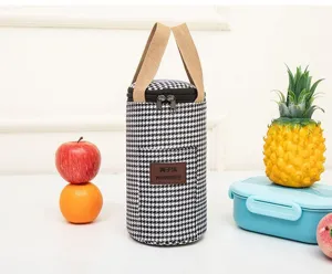 Black and white houndstooth insulated lunch bag cylindrical portable bento pouch for cups.