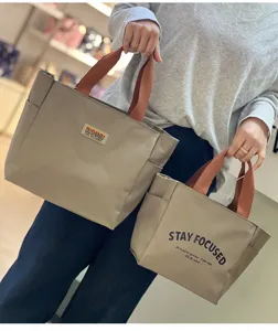 Minimalistische Oxford Stoff Tragetasche farblich abgesetzt grosse Kapazitaet Pendler Tasche