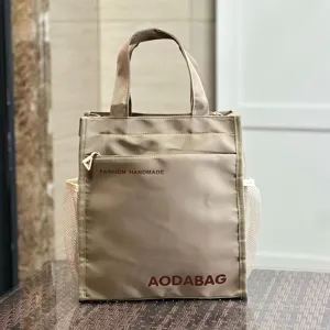 Large canvas lunch tote bag with side mesh pockets for work school daily use brown