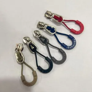 Colorful zipper pullers replacement tags with nylon cord and rubber ends for bags and jackets.
