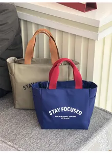 Oxford Stoff Lunchtasche Detail, zweifarbige Tragetasche, Freizeittasche für Pendler.