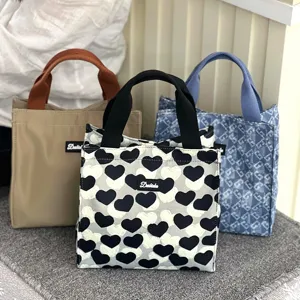 Large capacity canvas lunch handbag stylish color block tote bag for work and daily use.
