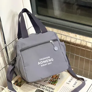 Grey insulated lunch bag waterproof crossbody tote commuter bento bag with cup holder