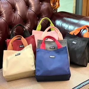 Large capacity color block lunch bag, portable canvas handbag for work, office and daily use.