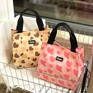 Chic heart print lunch bag with black handles, large capacity portable storage box for work.