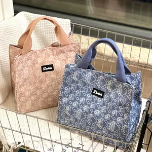 Canvas lunch bag with stylish pattern, large capacity portable handbag for daily use.