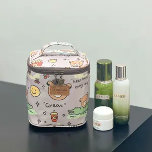 Waterproof cosmetic bag and lunch bag with cute cartoon prints for daily use.