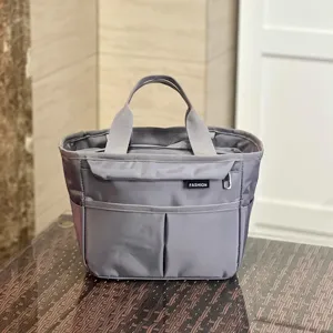 Grey multi-pocket waterproof lunch bag tote, perfect for commuting, work, and daily use.