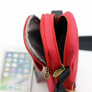 Bolso bandolera de nylon rojo para mujer, pequeño bolso de teléfono con múltiples cremalleras.