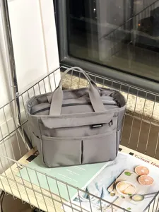 Grey waterproof multi-pocket lunch bag, large capacity commuter bento handbag for office daily.