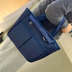 Waterproof insulated lunch bag with large capacity and multi-pocket tote for daily commute.