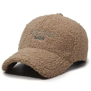 Detailed shot of brown teddy fleece baseball cap with Boston embroidery texture and soft material