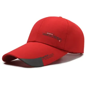 Detailed closeup view of the red canvas baseball cap featuring custom print and extended brim.