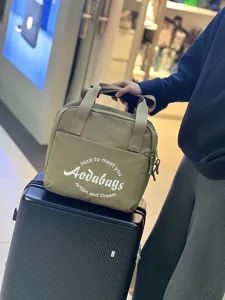 Sac de voyage pour courts trajets, sac fourre-tout élégant en toile kaki pour valise.