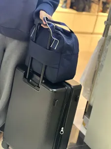 Grand sac de voyage spacieux avec manchon de valise en tissu oxford pour rangement