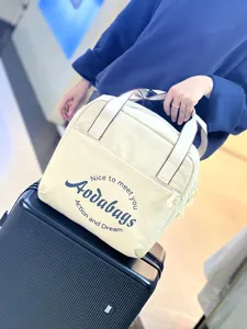Sac cabas de voyage en tissu oxford, grand sac de rangement pour valise de court sejour.