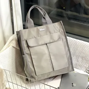 Grey multi-pocket canvas tote bag, large capacity student file and lunch storage bag.