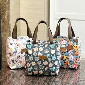 Cute cartoon insulated lunch bag, waterproof portable handbag for students and commuting.