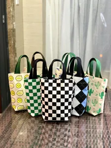 Canvas tote bag minimalist lunch bag reusable cute printed handbag for daily use and office.