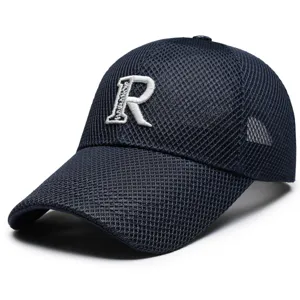 Close-up view of the breathable mesh baseball cap featuring detailed white letter embroidery.