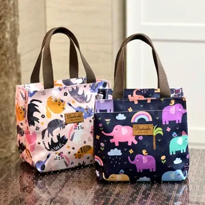 Waterproof cartoon insulated lunch bag for students and commuters with cute cat and elephant prints.