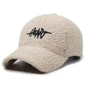 Beige teddy fleece baseball cap with black letter embroidery, stylish and cozy winter hat.