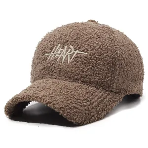 Brown teddy fleece baseball cap with embroidered heart letter detail for autumn and winter