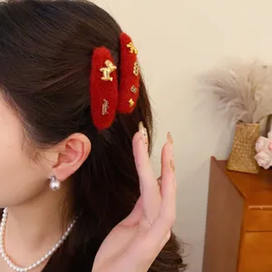 Red plush hair clip with cute gold pony charm, retro winter hair accessory for daily wear.