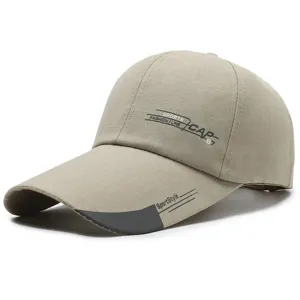 Close-up details of the khaki canvas baseball cap with long brim, unique letter print design.