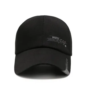 Detailed view of a black canvas baseball cap featuring stylish English letter prints for casual wear.